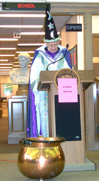 A speaker dressed as a wizard.
