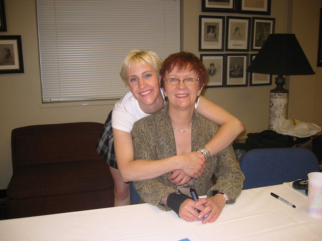 An author at a book signing.
