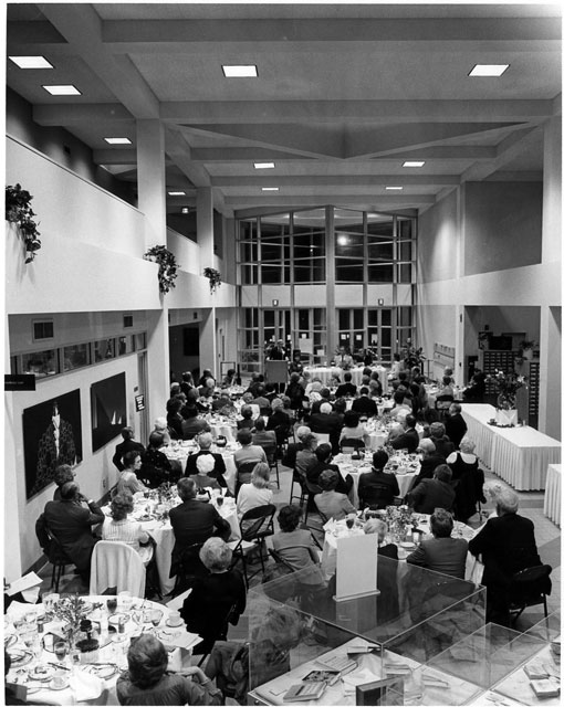 A Friends banquet held in the lobby of the Mary Couts Burnett Library.
